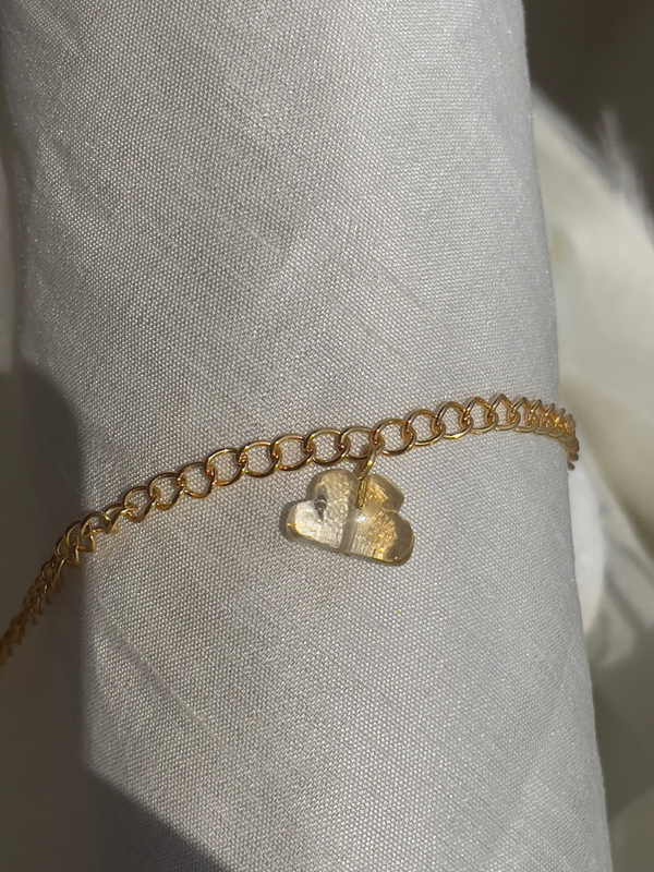 Citrine charm bracelet in sterling silver in 18ct gold plated . Helps in Manifesting money and opportunity