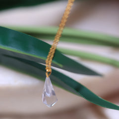 Clar quartz pendant in 18ct gold plated  sterling silver & brass .this crystal pendant helps in  making your MANIFESTATION STRONGER