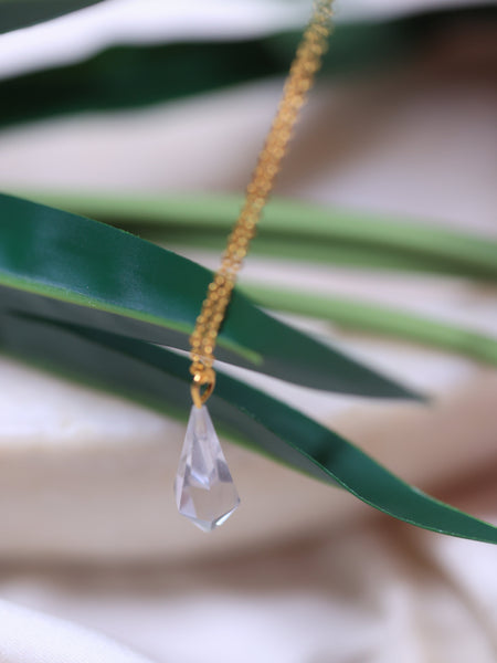 Clar quartz pendant in 18ct gold plated  sterling silver & brass .this crystal pendant helps in  making your MANIFESTATION STRONGER