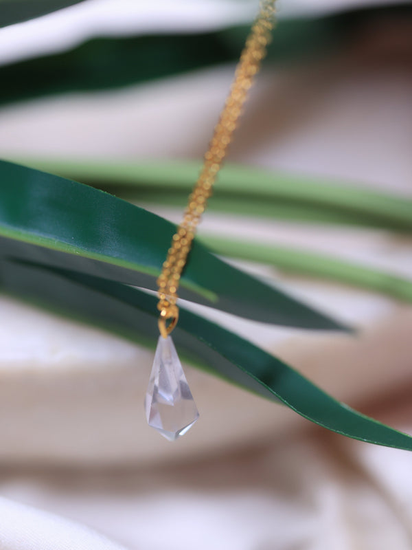 Clar quartz pendant in 18ct gold plated  sterling silver & brass .this crystal pendant helps in  making your MANIFESTATION STRONGER