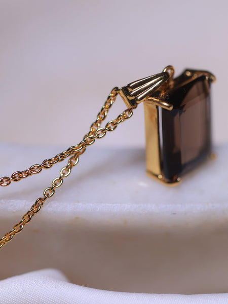 smoy quartz crystal pendant in 18ct gold plated Brass and &Sterling silver .this crystal jewlery will protect you from Negative ENERGY  