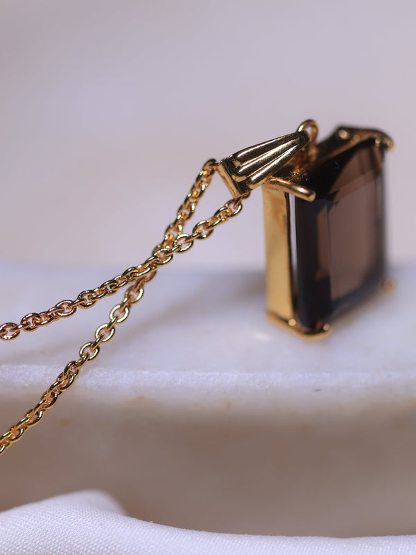 smoy quartz crystal pendant in 18ct gold plated Brass and &Sterling silver .this crystal jewlery will protect you from Negative ENERGY  